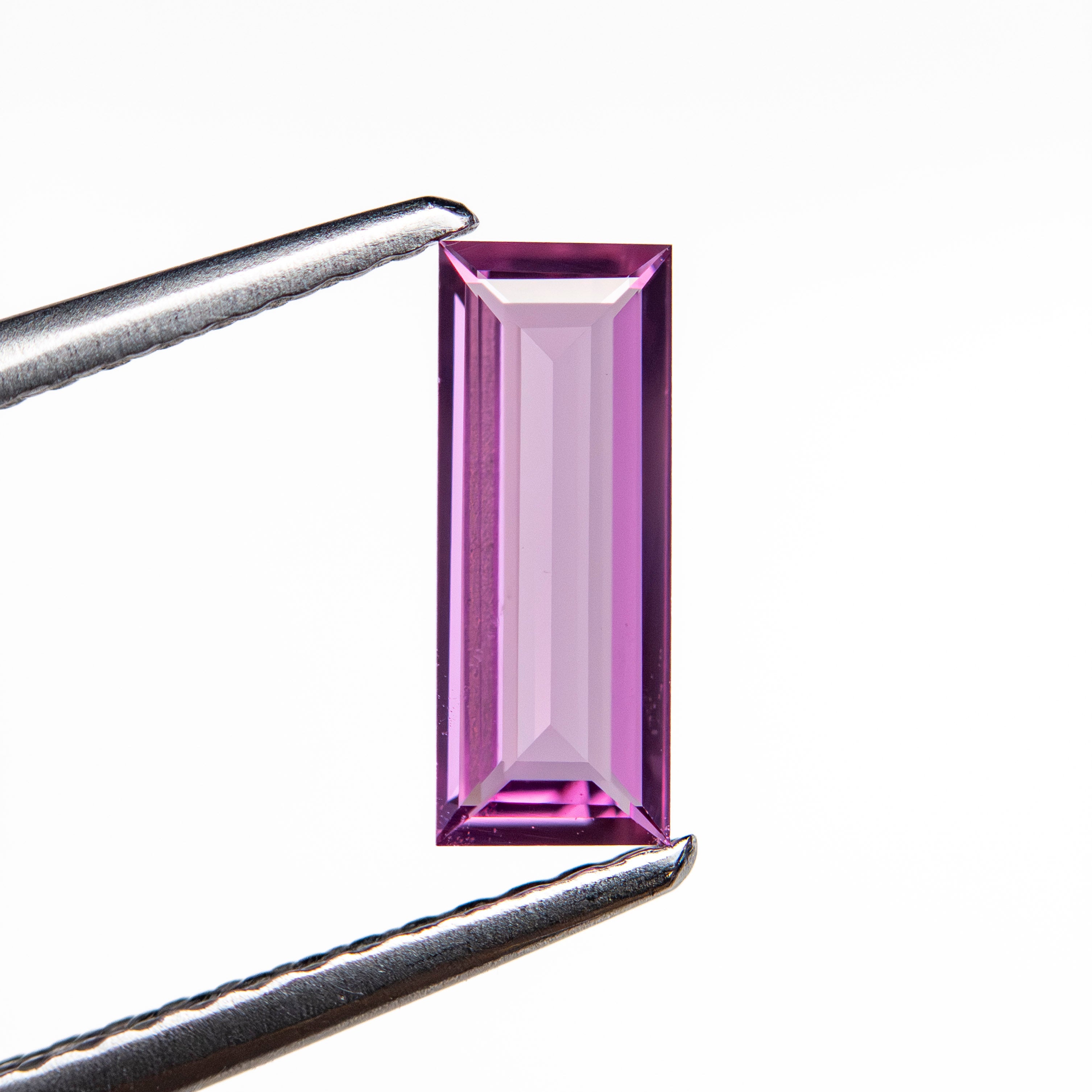 0.66ct 9.07x3.53x1.68mm Baguette Step Cut Sapphire 27721-10