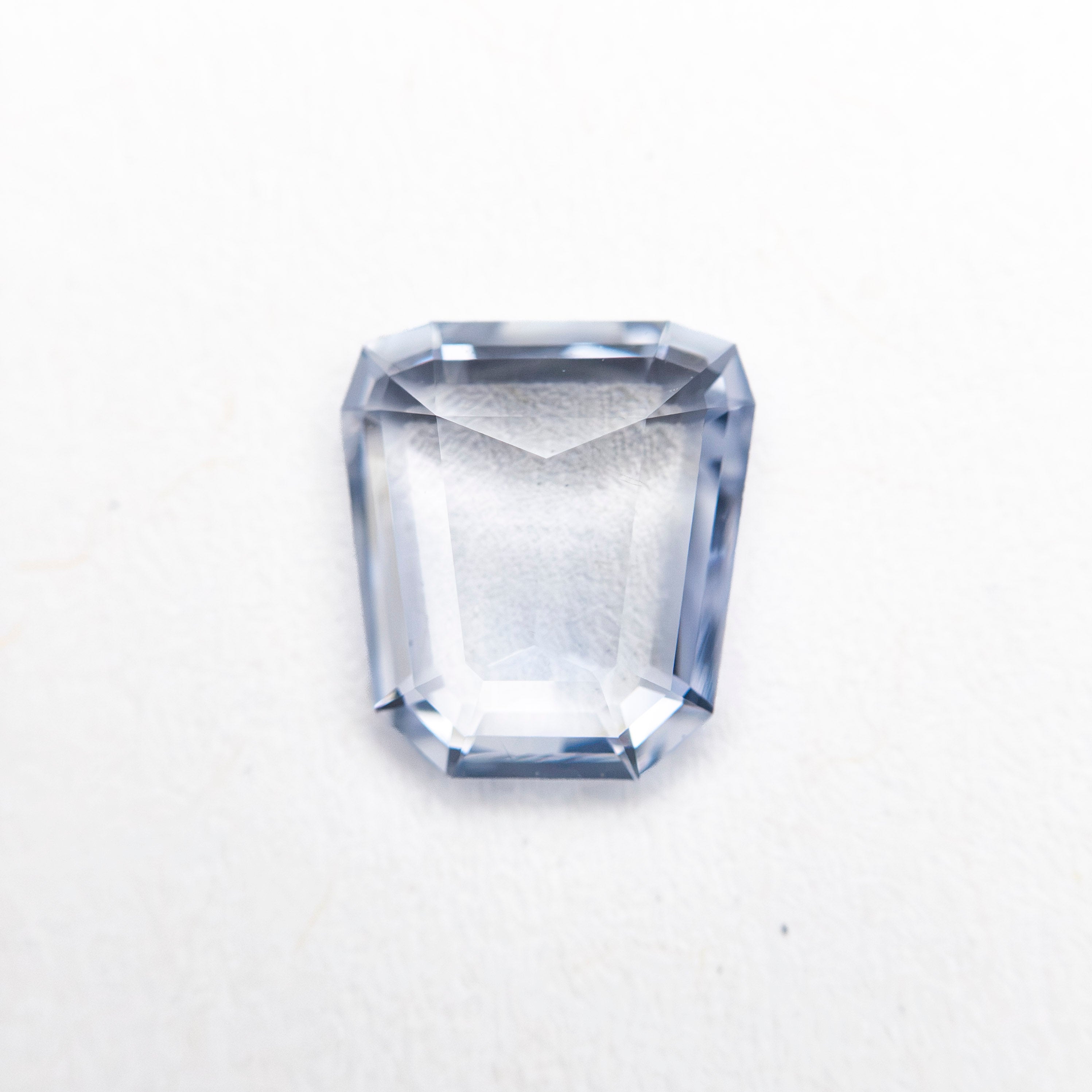 1.12ct 6.95x6.31x2.41mm Trapezoid Step Cut Sapphire 27740-17-Staghead Designs