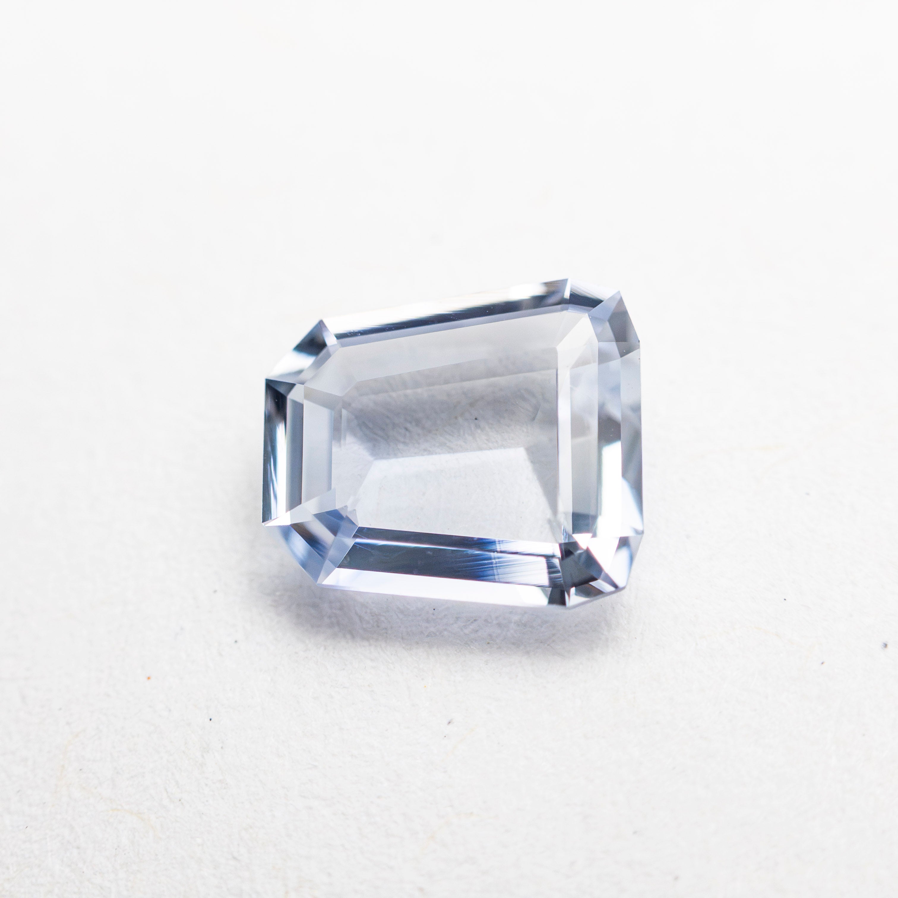 1.12ct 6.95x6.31x2.41mm Trapezoid Step Cut Sapphire 27740-17-Staghead Designs