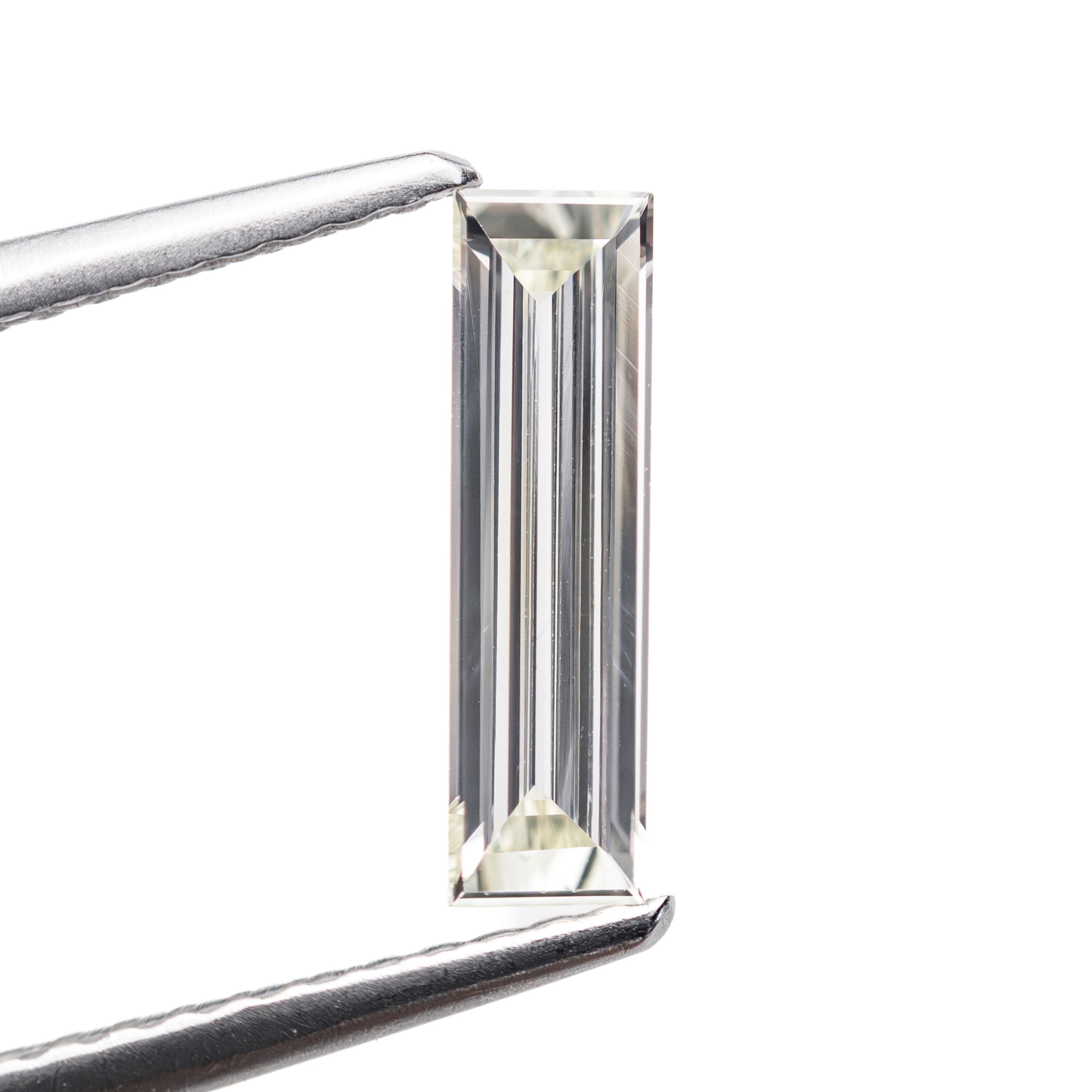 0.45ct 10.50x2.98x1.42mm VS2 Q-R Baguette Step Cut 27911-01-Staghead Designs