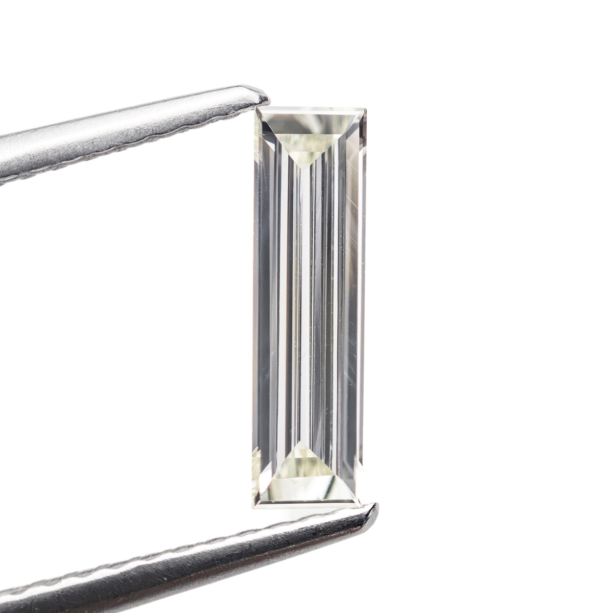 0.45ct 10.50x2.98x1.42mm VS2 Q-R Baguette Step Cut 27911-01-Staghead Designs