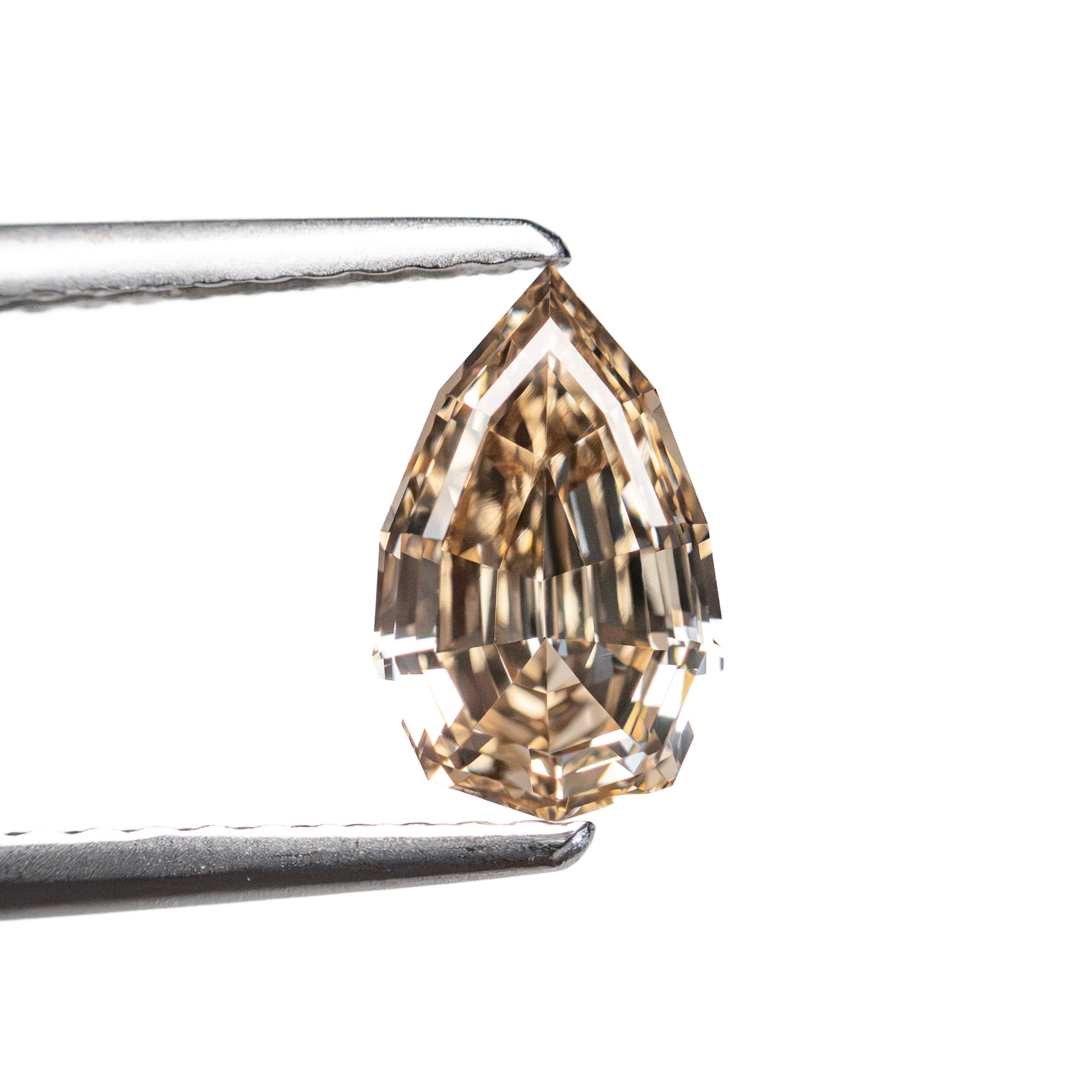1.07ct 8.54x5.34x3.34 VS2 Fancy Orangey Brown Geo Pear Step Cut 28053-01