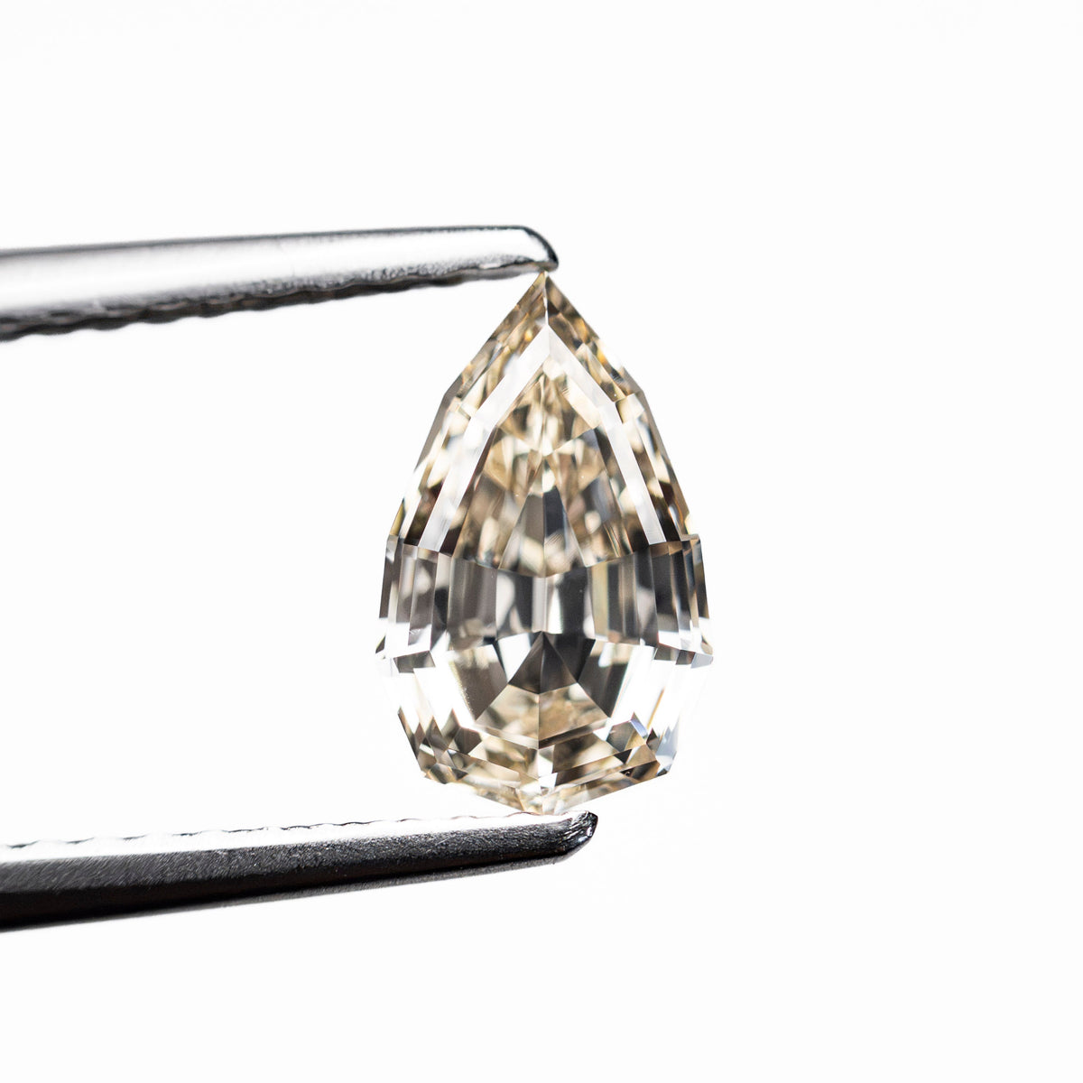 1.06ct 8.52x5.22x3.28mm VVS2 W-X Geo Pear Step Cut 28054-01-Staghead Designs