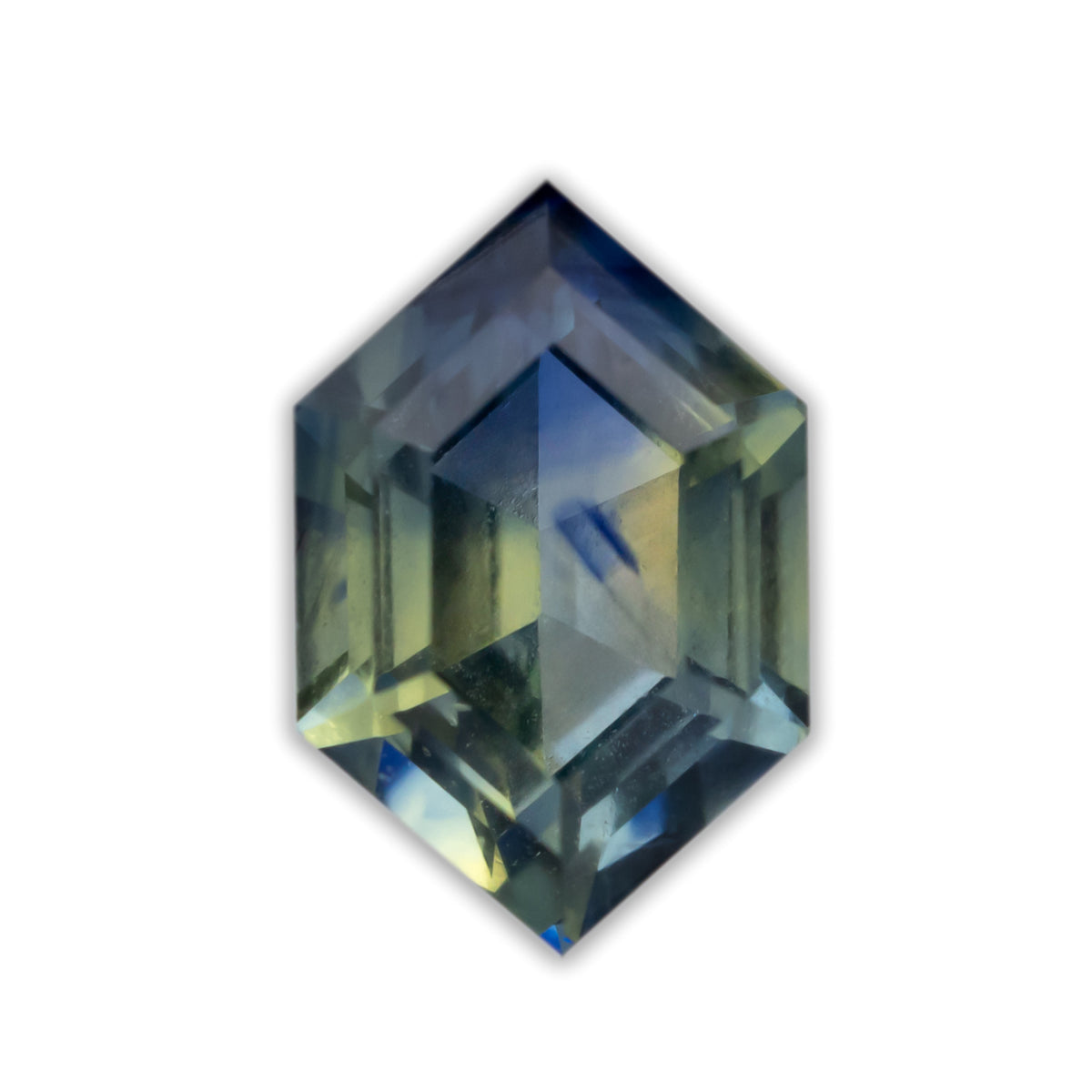 A faceted hexagon sapphire with blue-green color against a white background
