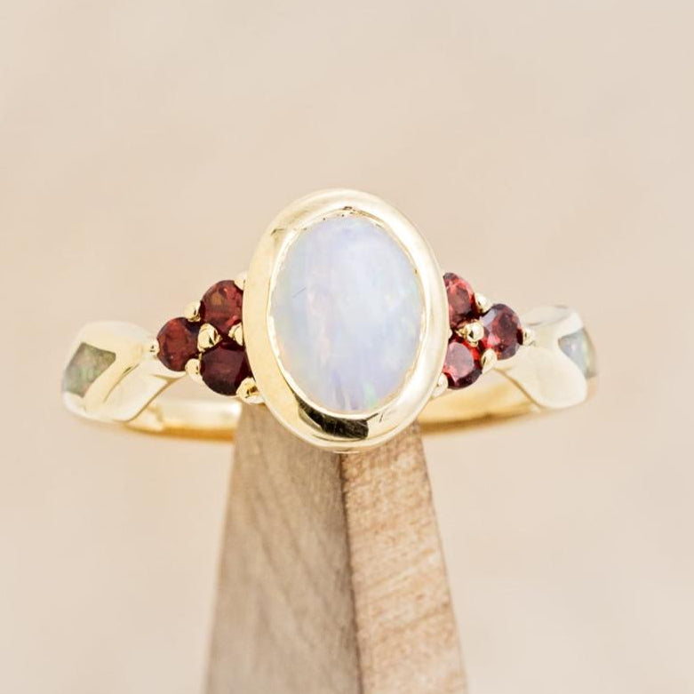 "AGATHA" - BEZEL SET OVAL CABOCHON CUT WHITE OPAL ENGAGEMENT RING WITH GARNET ACCENTS AND FIRE & ICE OPAL INLAYS-Staghead Designs
