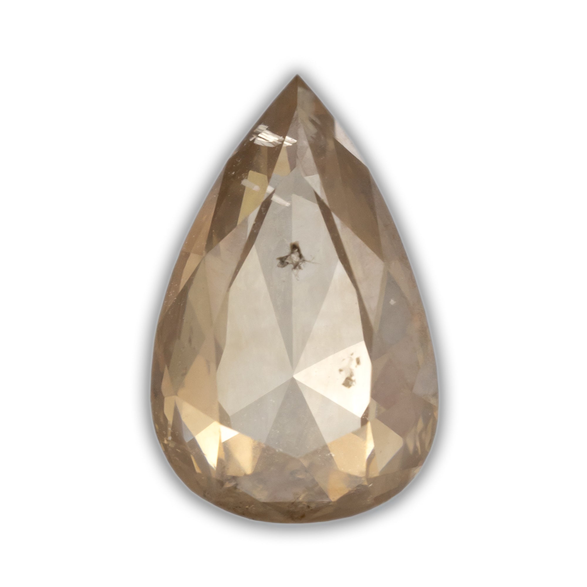 Pear cut champagne diamond on a white background