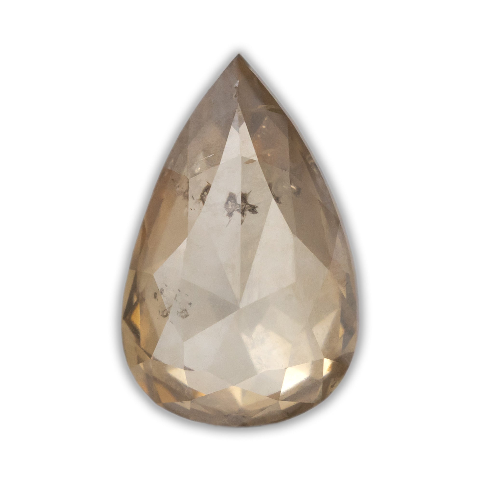 Pear cut champagne diamond on a white background