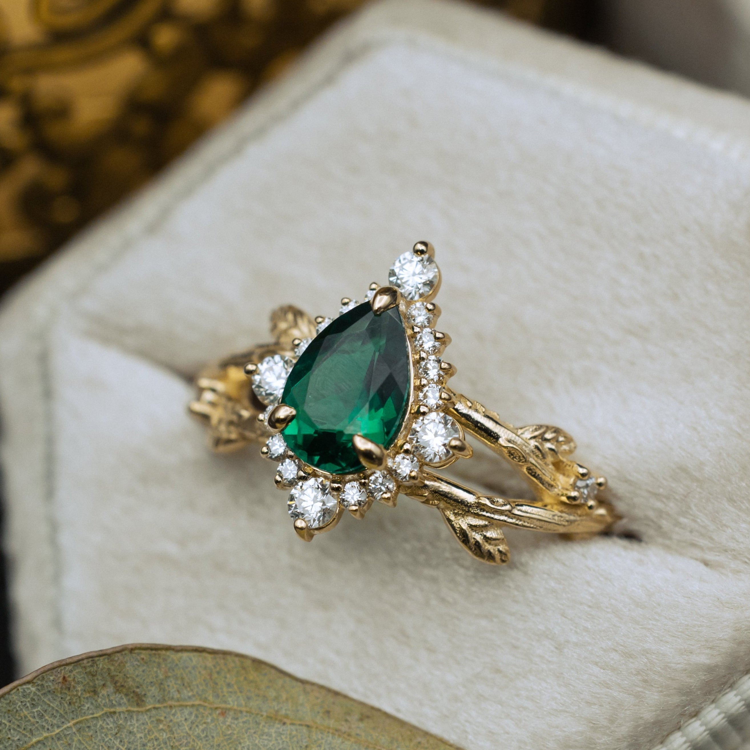 "ARTEMIS ON THE VINE DIVINE" - PEAR LAB-GROWN EMERALD ENGAGEMENT RING WITH DIAMOND ACCENTS & A BRANCH-STYLE BAND-Staghead Designs