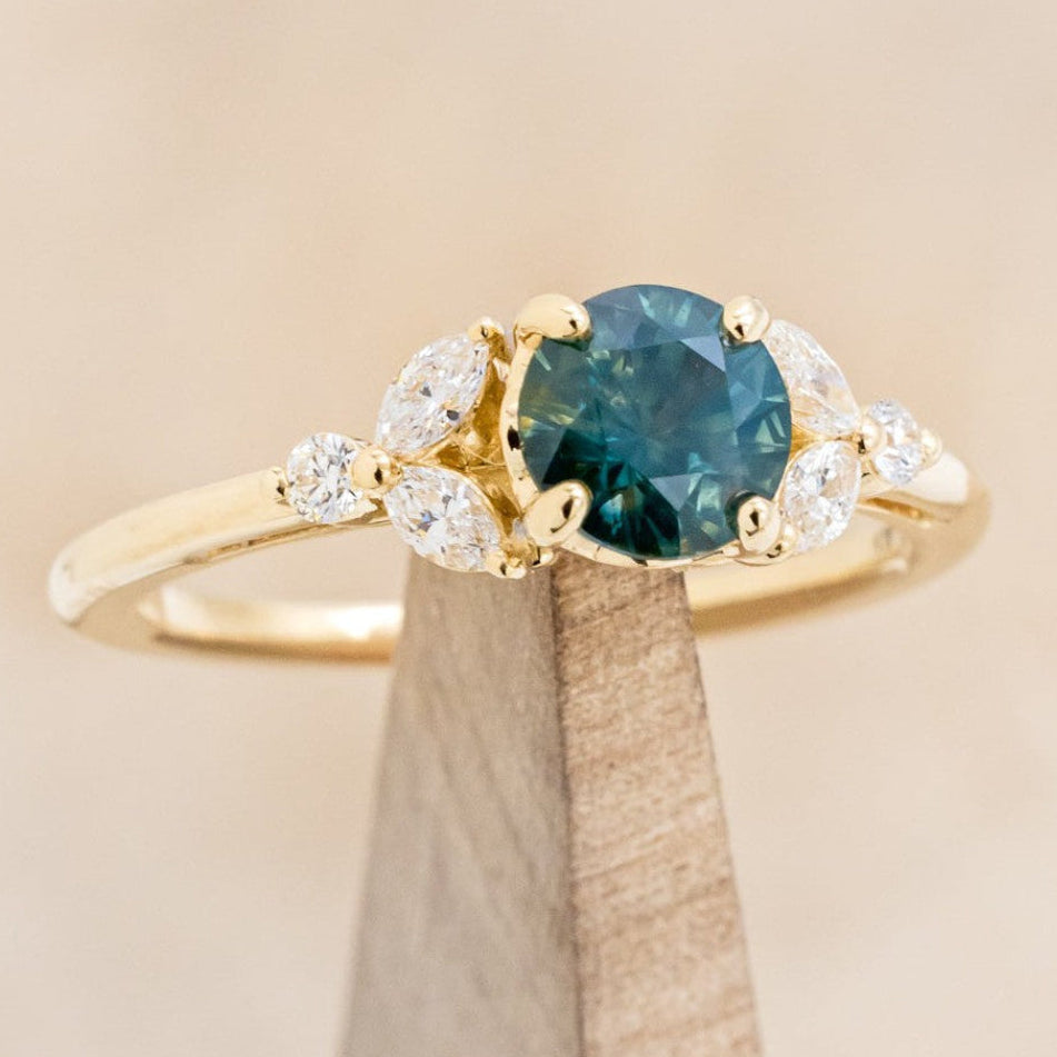 "BLOSSOM" - ROUND CUT MONTANA SAPPHIRE ENGAGEMENT RING WITH LEAF-SHAPED DIAMOND ACCENTS-1