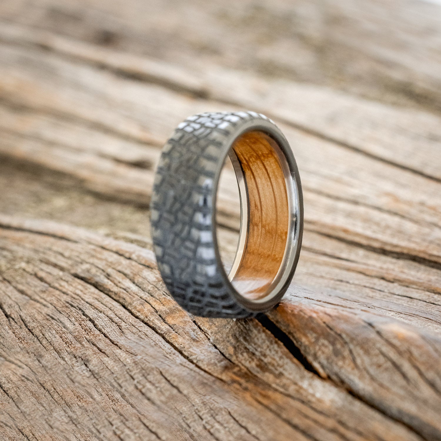 "PARCEL" - CUSTOM EMBOSSED TIRE TREAD WEDDING RING WITH A WHISKEY BARREL LINING-4