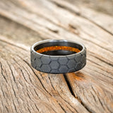 "ECHO" - HONEYCOMB ENGRAVED WEDDING RING FEATURING AN ORANGE OPAL LINING IN A SANDBLASTED FINISH