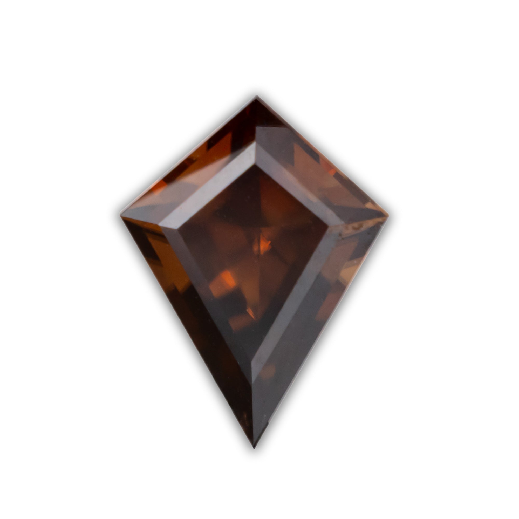 Kite cute zircon with copper brown color on a white background