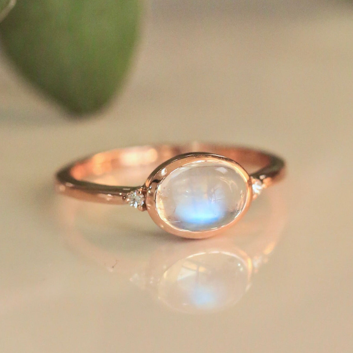 "Sasi" - Oval Cabochon Moonstone Engagement Ring With Diamond Accents