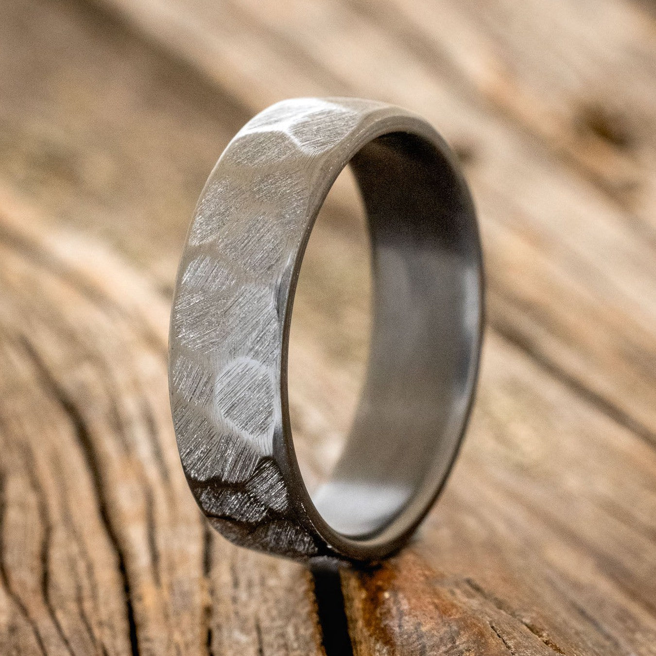 FACETED BLACK ZIRCONIUM RING WITH A TEXTURED FINISH-1
