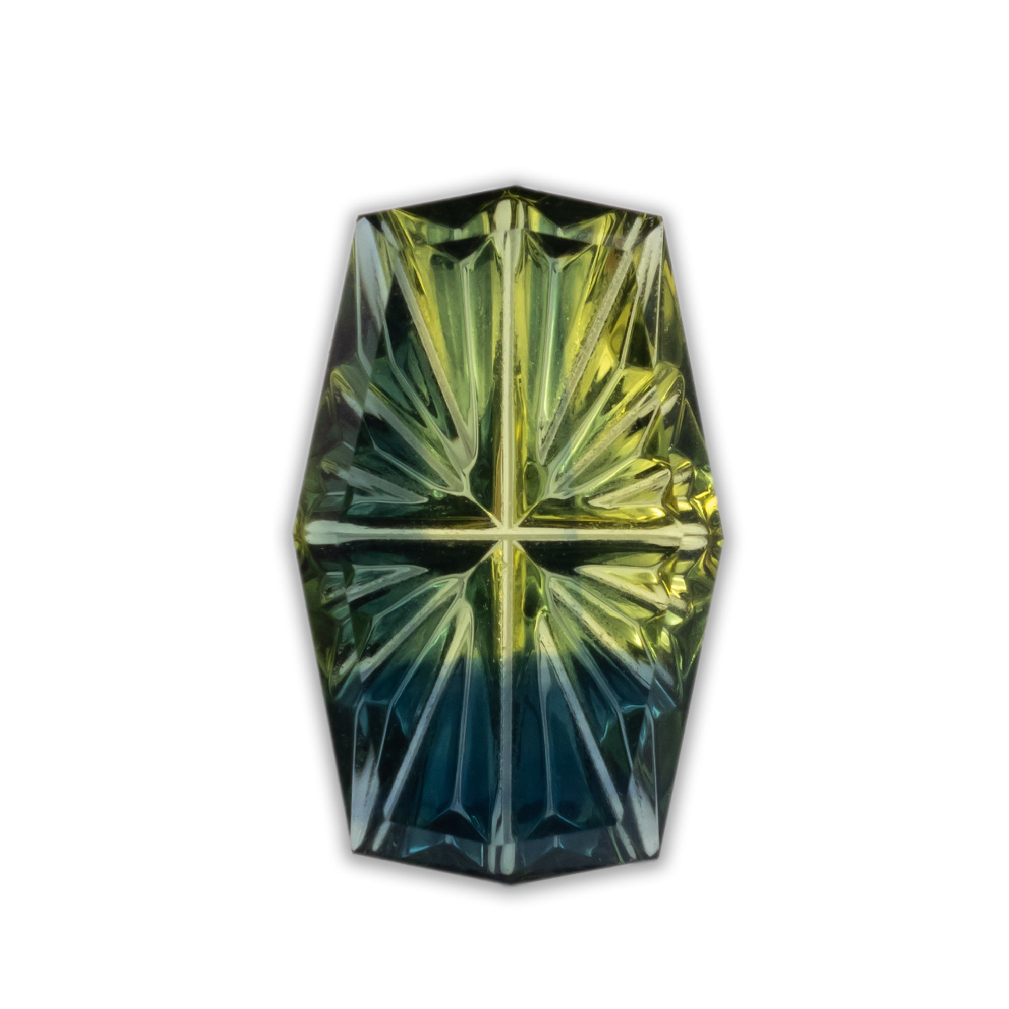 Elongated cushion cut green sapphire on a white background