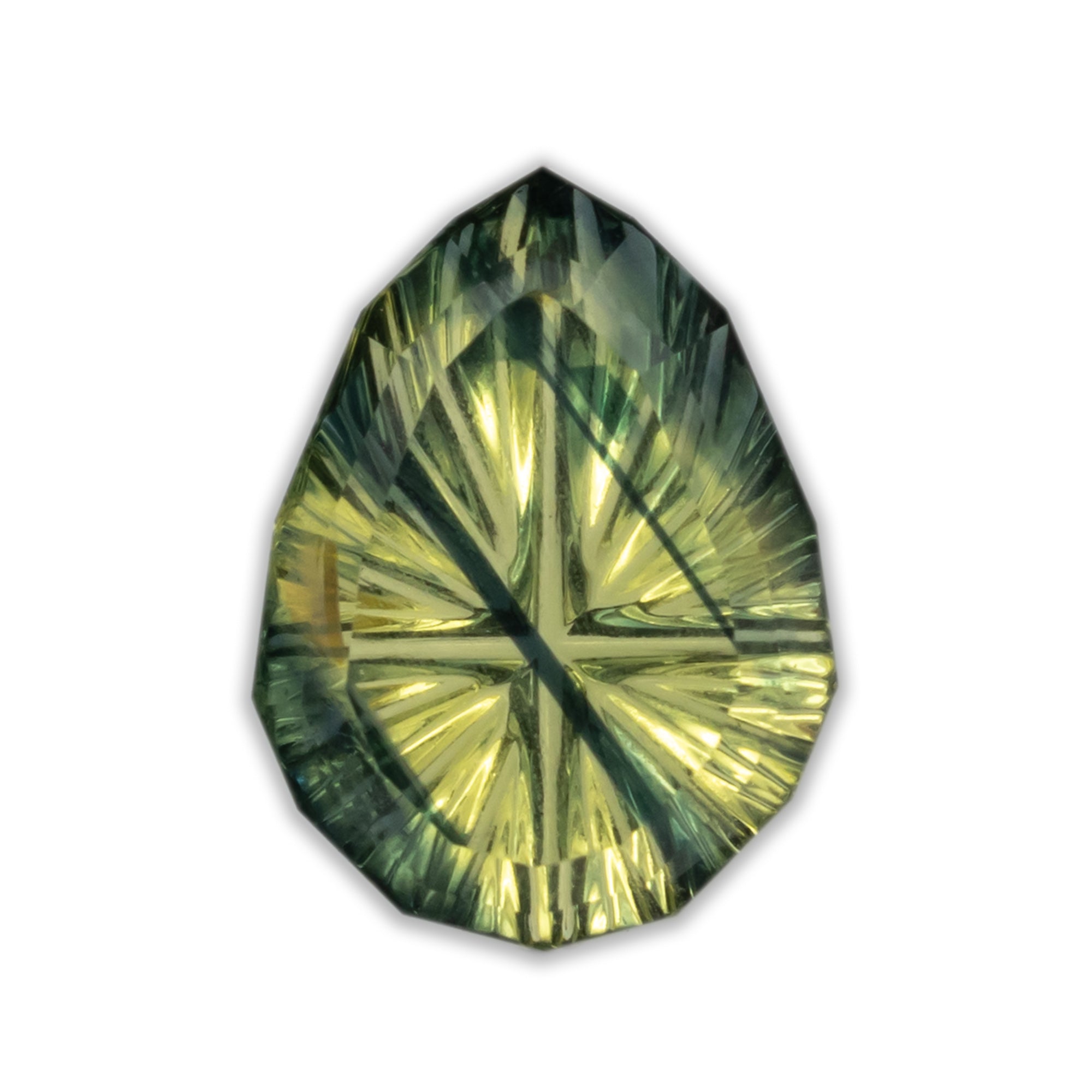 Pear cut green colored sapphire with starburst effect on a white background