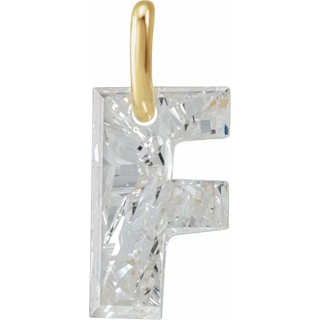 Diamond pendant shaped like the letter 'F' on a white background