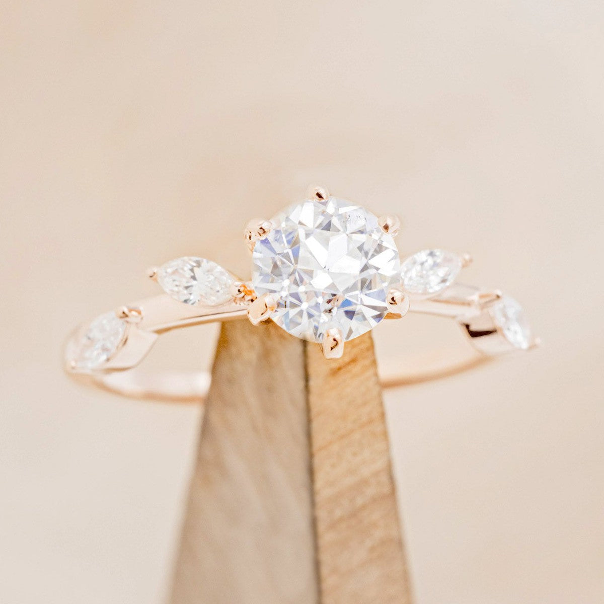 "FLORA" - ROUND CUT MOISSANITE ENGAGEMENT RING WITH LEAF-SHAPED DIAMOND ACCENTS-1