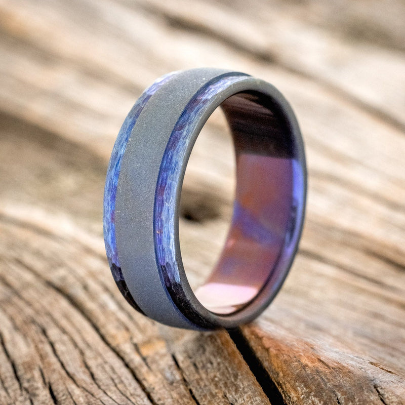 SANDBLASTED RAISED CENTER FIRE-TREATED TITANIUM WITH A HAMMERED EDGES