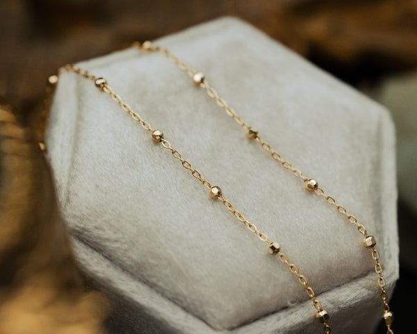 FACETED BEAD SATURN CHAIN NECKLACE IN 14K YELLOW GOLD-2