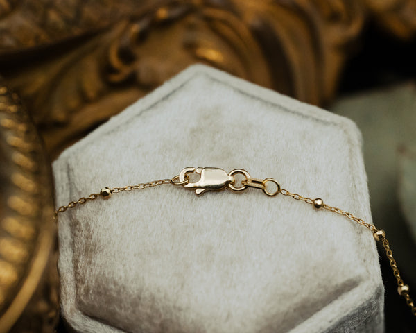 FACETED BEAD SATURN CHAIN NECKLACE IN 14K YELLOW GOLD-4