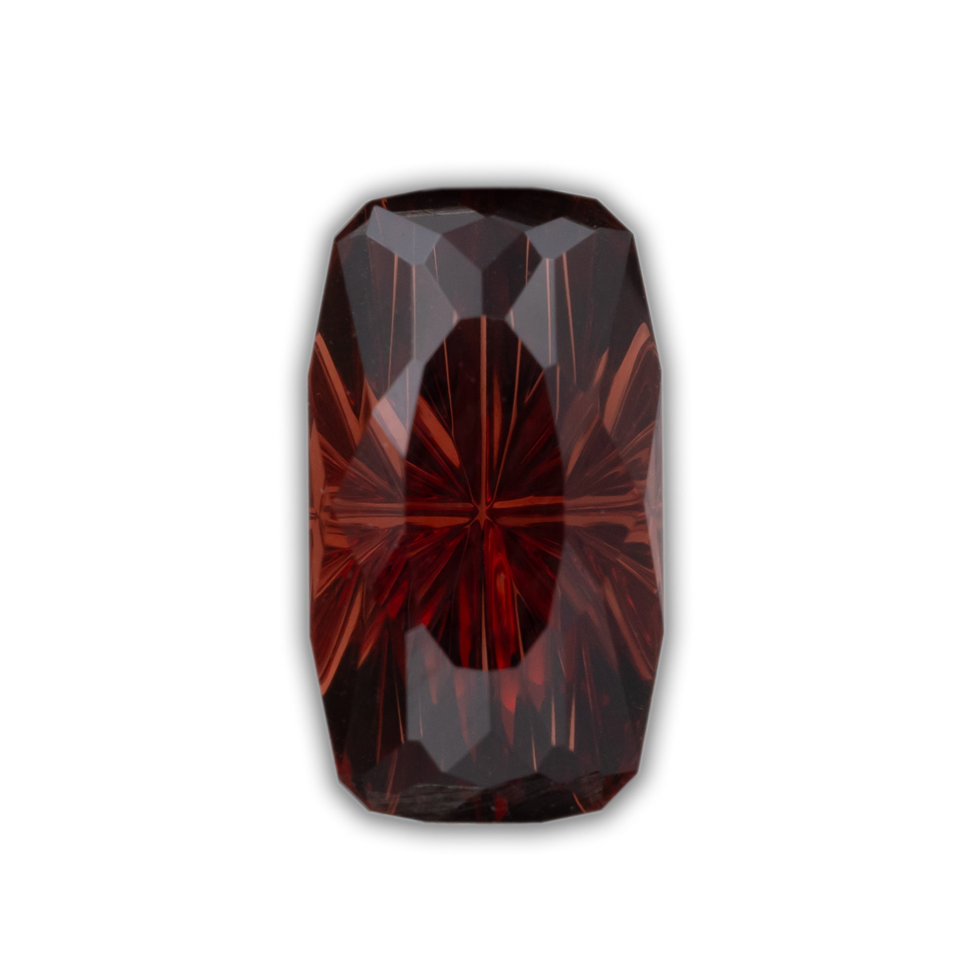 A deep red garnet on a white background