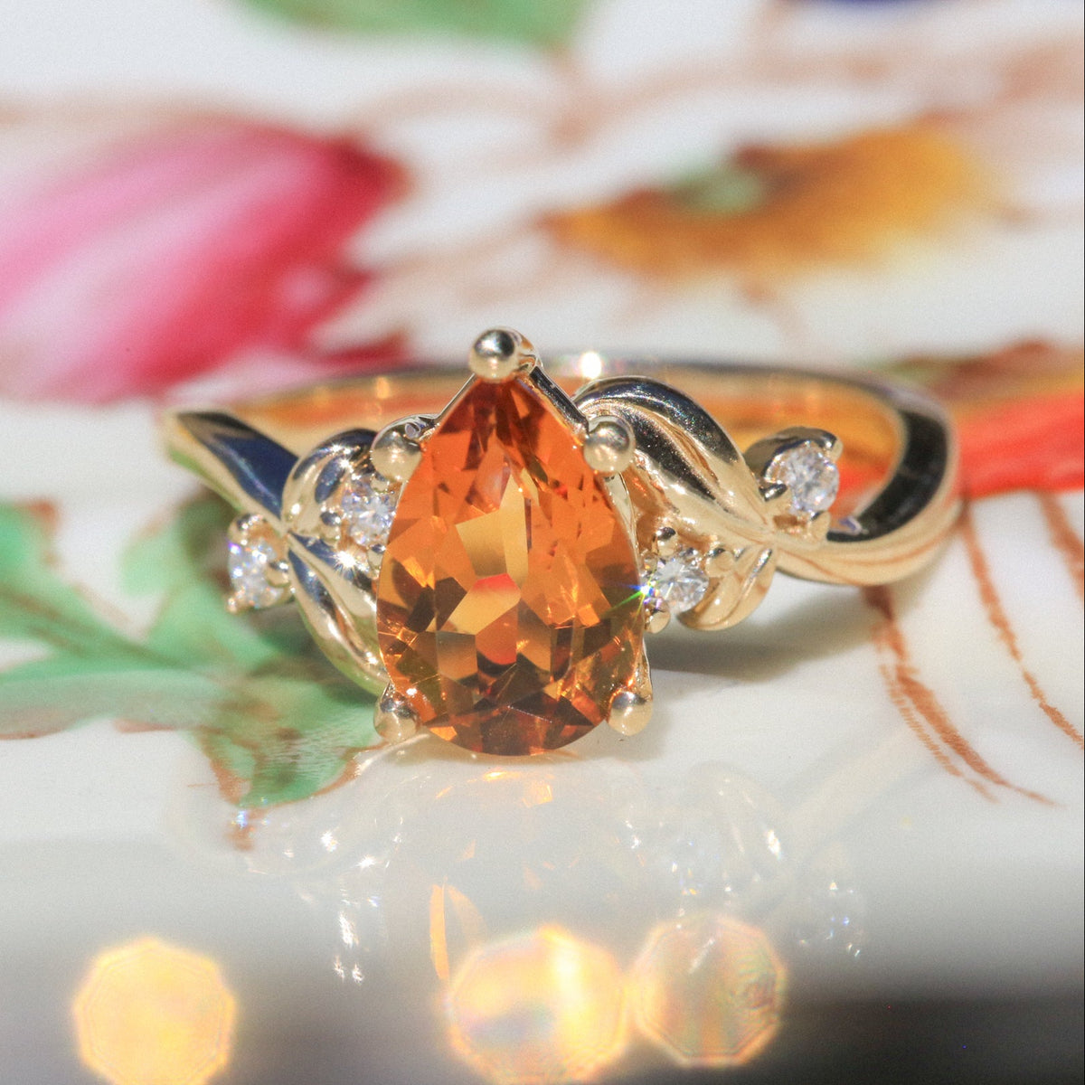 "Gladys" - Pear Cut Citrine Engagement Ring With Diamond Accents On A Floral-Style Band-Staghead Designs