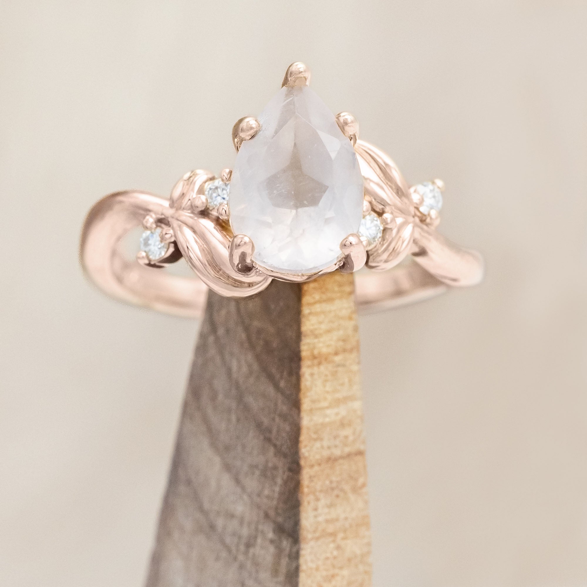 "GLADYS" - PEAR CUT ENGAGEMENT RING WITH DIAMOND ACCENTS ON A FLORAL-STYLE BAND-Staghead Designs