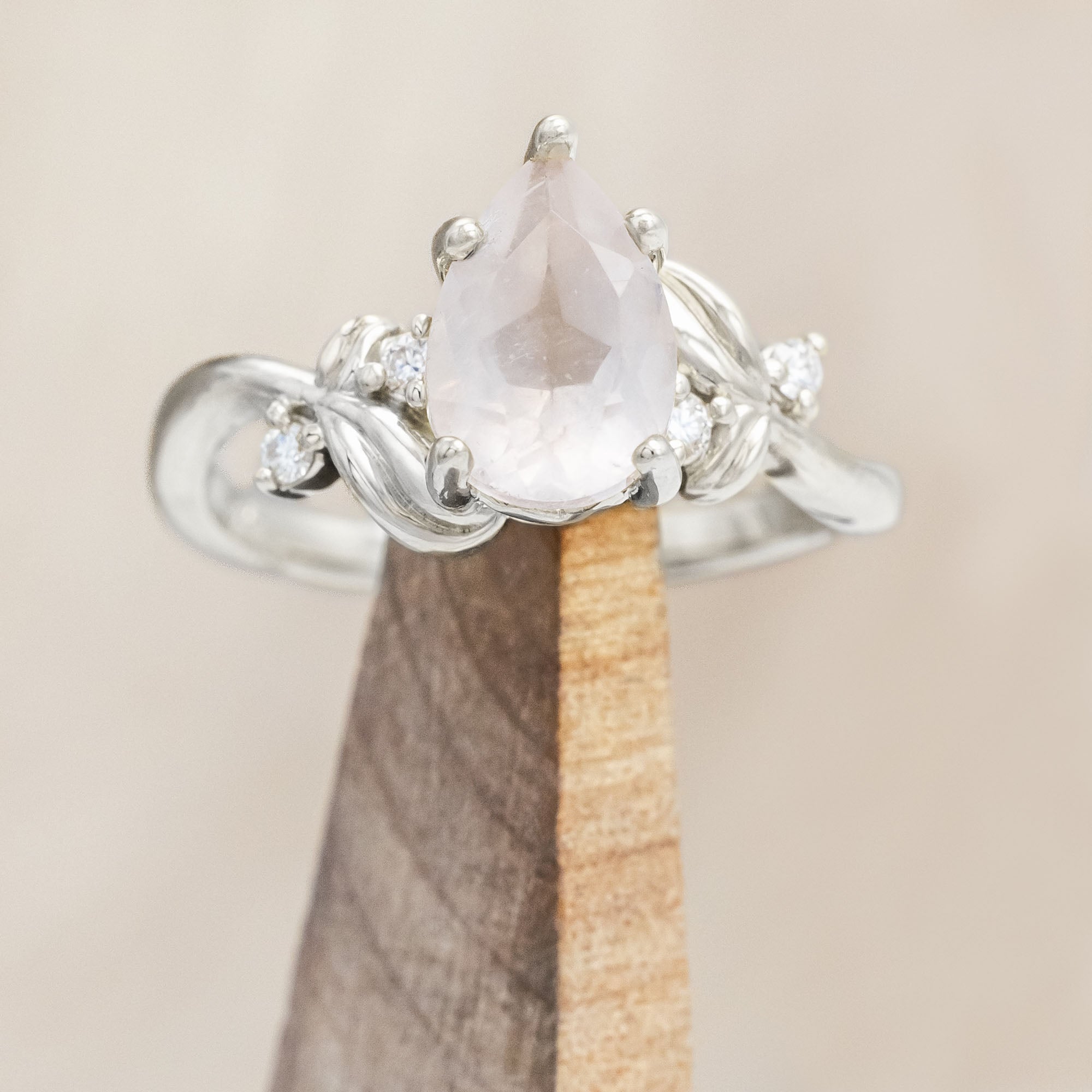 "GLADYS" - PEAR CUT ENGAGEMENT RING WITH DIAMOND ACCENTS ON A FLORAL-STYLE BAND-Staghead Designs