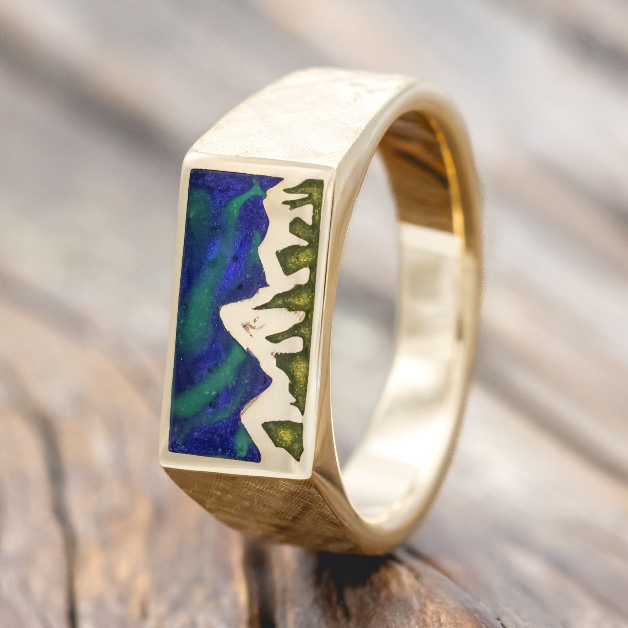 "ATLAS" - MOUNTAIN ENGRAVED WEDDING BAND WITH GLOW IN THE DARK NORTHERN LIGHTS, A MYSTIC MOSS INLAY, AND A FLORENTINE FINISH-Staghead Designs