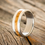 "NIRVANA" - CENTERED WHISKEY BARREL INLAY WEDDING BAND WITH HAMMERED FINISH