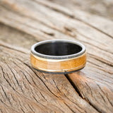 "HOLLIS" - WHISKEY BARREL & 14K YELLOW GOLD INLAYS WEDDING RING FEATURING A HAMMERED BAND - BLACK ZIRCONIUM - SIZE 11-3