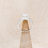 "QUEEN OF THE THRONE" - ROUND CUT MOISSANITE ENGAGEMENT RING WITH DIAMOND ACCENTS