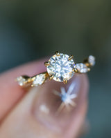 "FLORA" - ROUND CUT MOISSANITE ENGAGEMENT RING WITH LEAF-SHAPED DIAMOND ACCENTS - 14K YELLOW GOLD - SIZE 4 1/2-Staghead Designs