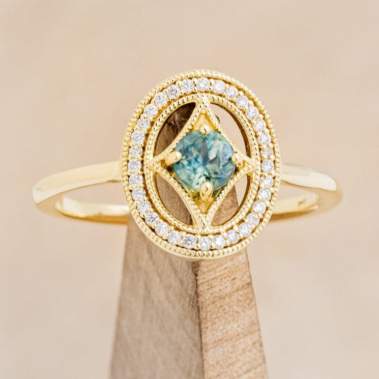 "LEVINA" - ROUND CUT MONTANA SAPPHIRE ENGAGEMENT RING WITH DIAMOND HALO-1