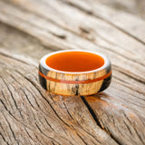 "REMMY" - BLACK & WHITE EBONY WOOD WITH JASPER WEDDING RING - ORANGE ACRYLIC LINING - SIZE 8 1/2-3