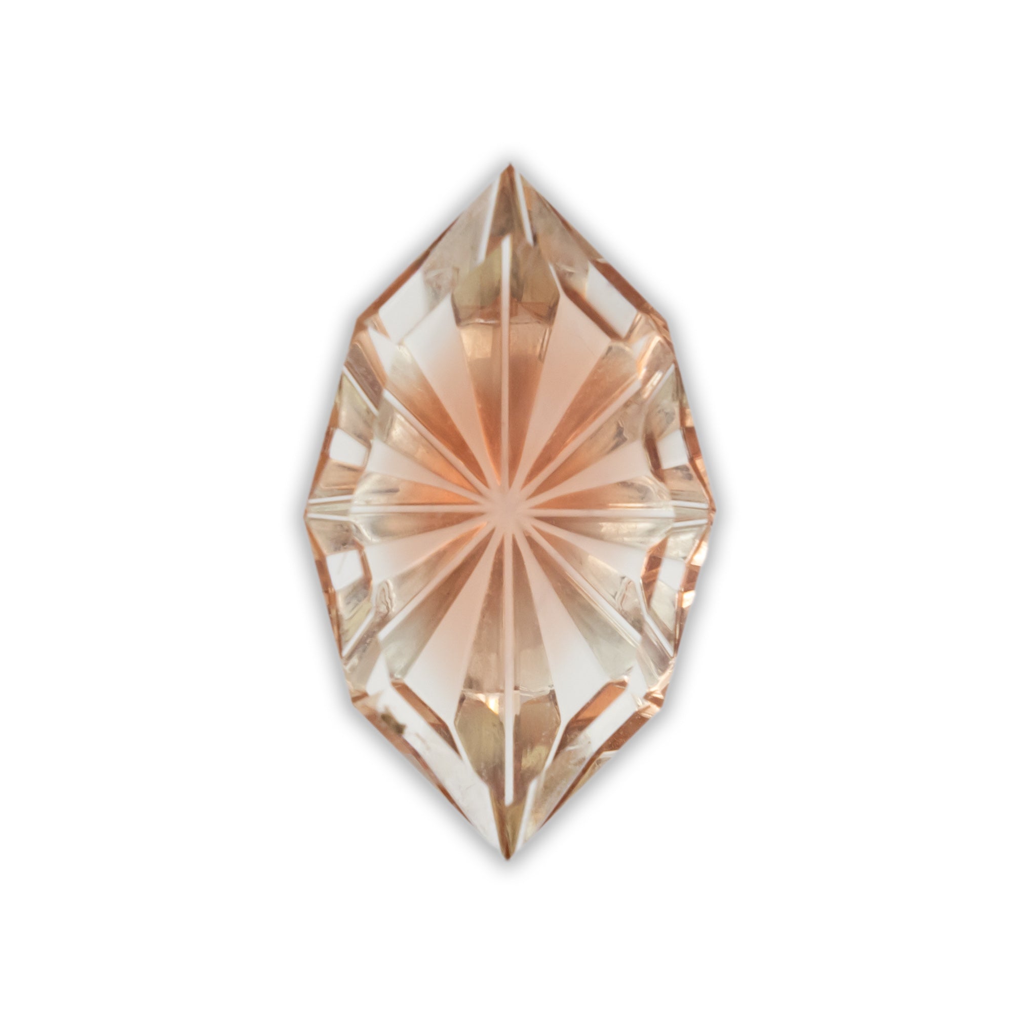 Marquise cut peach sunstone on a white background