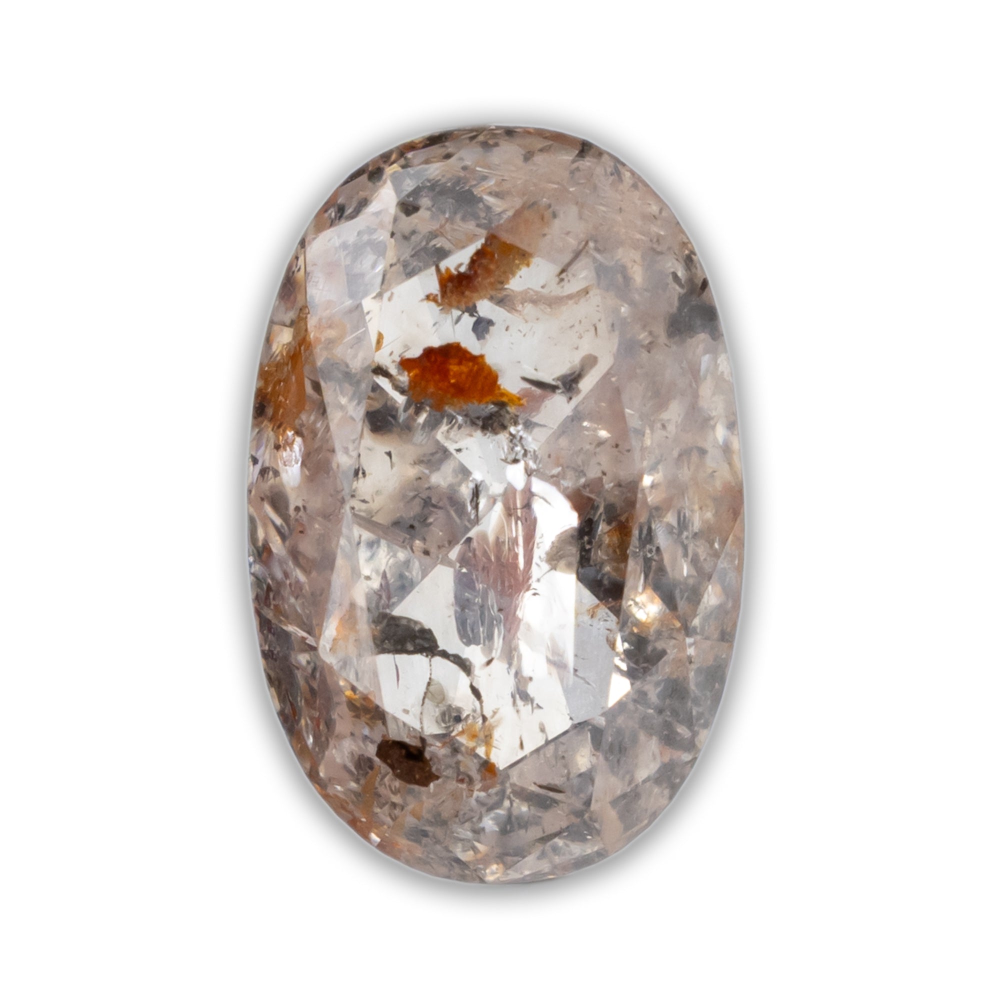 An oval-cut clear gemstone with internal inclusions and brownish-orange inclusions, shown on a plain white background.