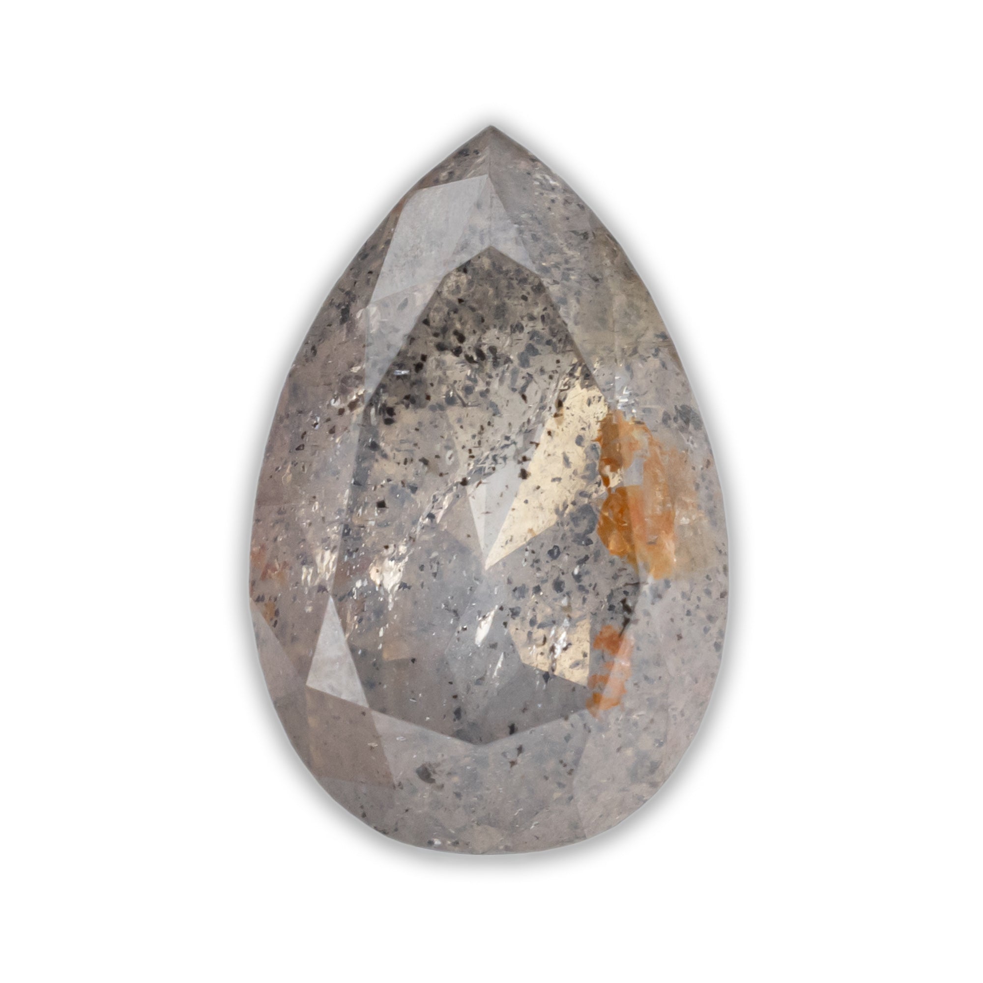 A pear cut salt & pepper diamond with speckled gray and orange-brown inclusions on a white background