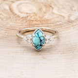 "RAYA" - MARQUISE TURQUOISE ENGAGEMENT RING WITH DIAMOND ACCENTS