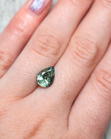 "PEAK" - PEAR CUT LIGHT GREEN MONTANA SAPPHIRE-7