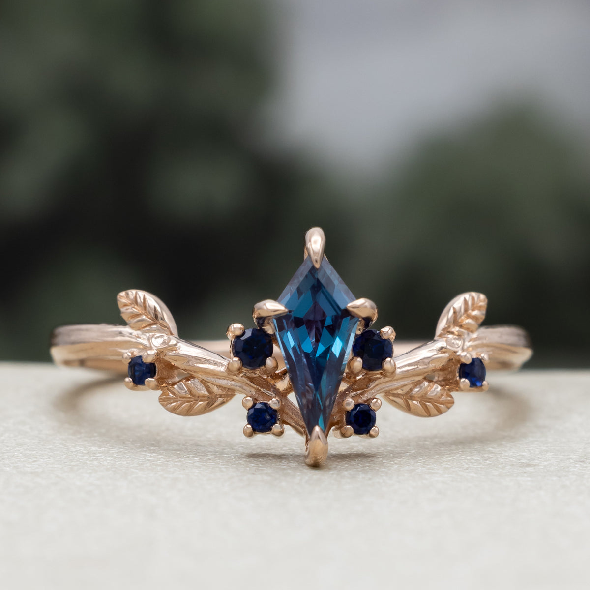 "Artemisia" - Kite Cut Lab-Grown Alexandrite Engagement Ring With Blue Sapphire Accents-Staghead Designs