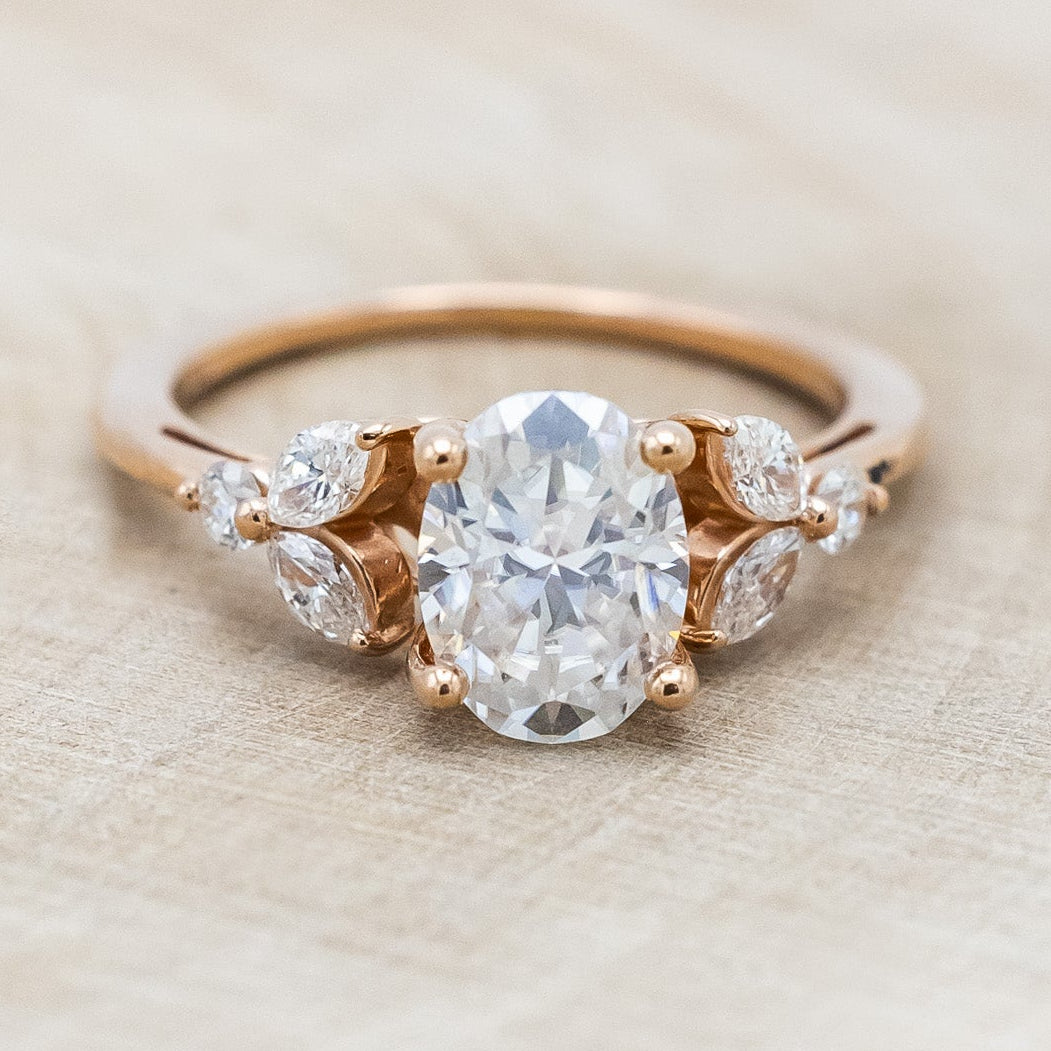 "BLOSSOM" - OVAL MOISSANITE ENGAGEMENT RING WITH LEAF-SHAPED DIAMOND ACCENTS-Staghead Designs