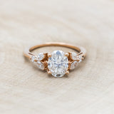 "BLOSSOM" - OVAL MOISSANITE ENGAGEMENT RING WITH LEAF-SHAPED DIAMOND ACCENTS-Staghead Designs