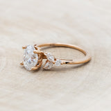 "BLOSSOM" - OVAL MOISSANITE ENGAGEMENT RING WITH LEAF-SHAPED DIAMOND ACCENTS-Staghead Designs