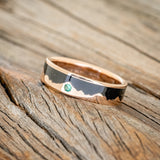 "HELIOS" - JET STONE & GOLD MOUNTAIN RANGE WEDDING RING FEATURING AN EMERALD ACCENT
