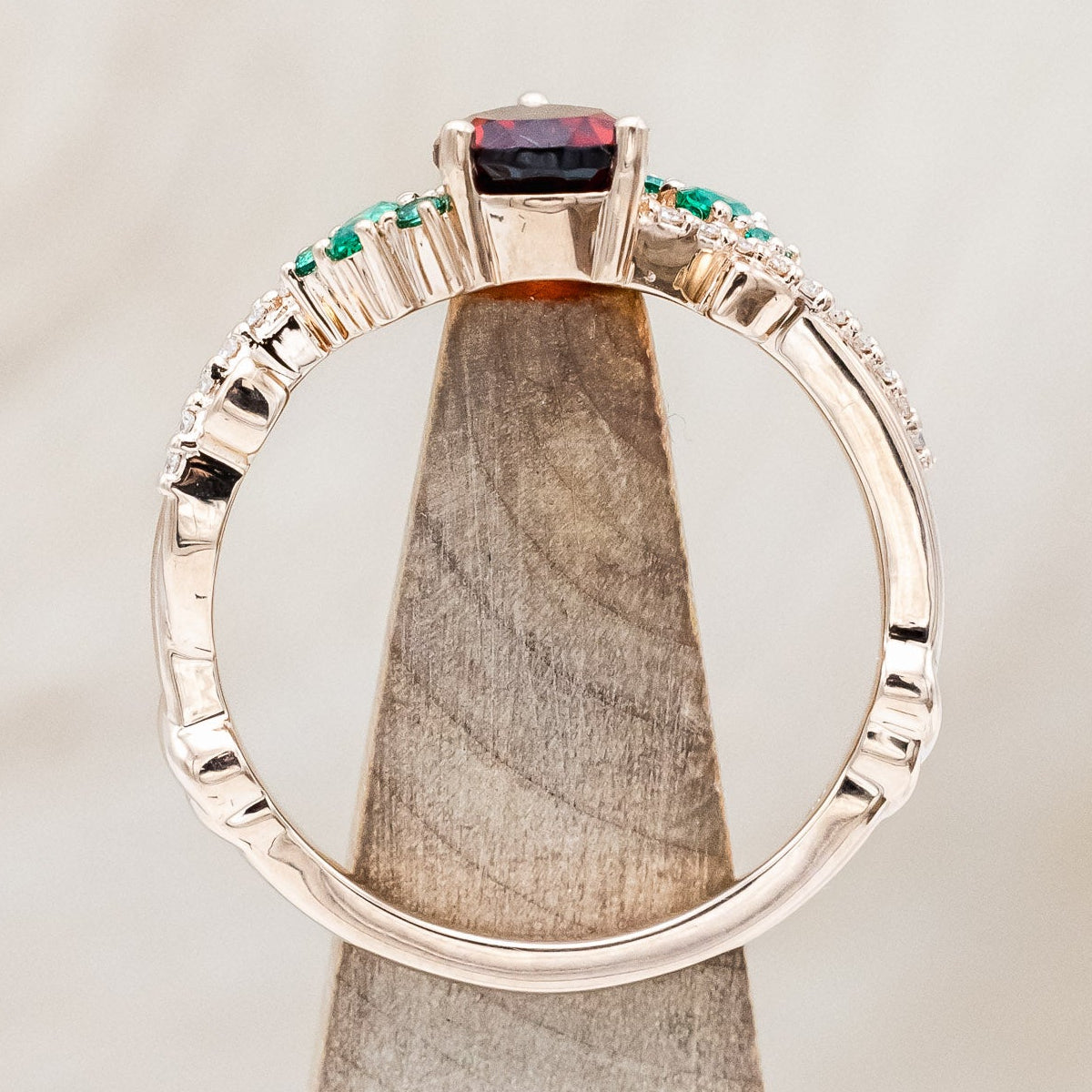 "KAMILA" - PEAR CUT MOZAMBIQUE GARNET ENGAGEMENT RING WITH EMERALD & DIAMOND ACCENTS-Staghead Designs