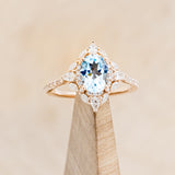 "NORTH STAR" - OVAL SKY BLUE TOPAZ ENGAGEMENT RING WITH DIAMOND HALO & ACCENTS-1