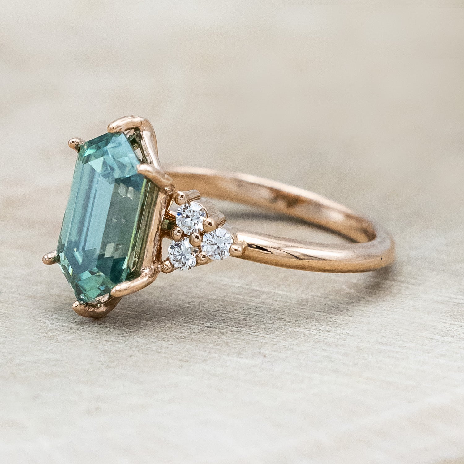 "OCTAVIA" - ELONGATED HEXAGON CUT GREEN MOISSANITE ENGAGEMENT RING WITH DIAMOND ACCENTS-Staghead Designs