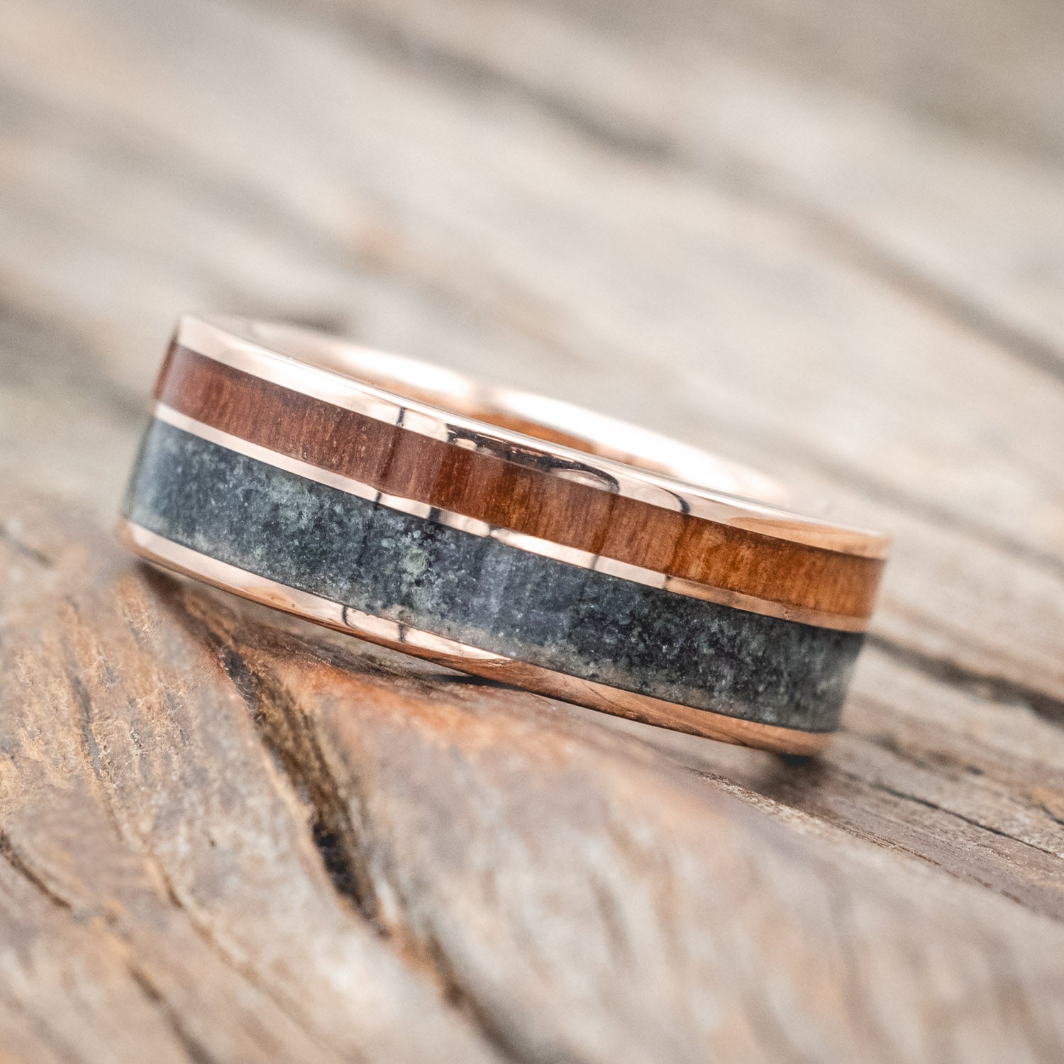 "Raptor"- men's wedding ring featuring moss agate and redwood inlays on a moss agate lined band